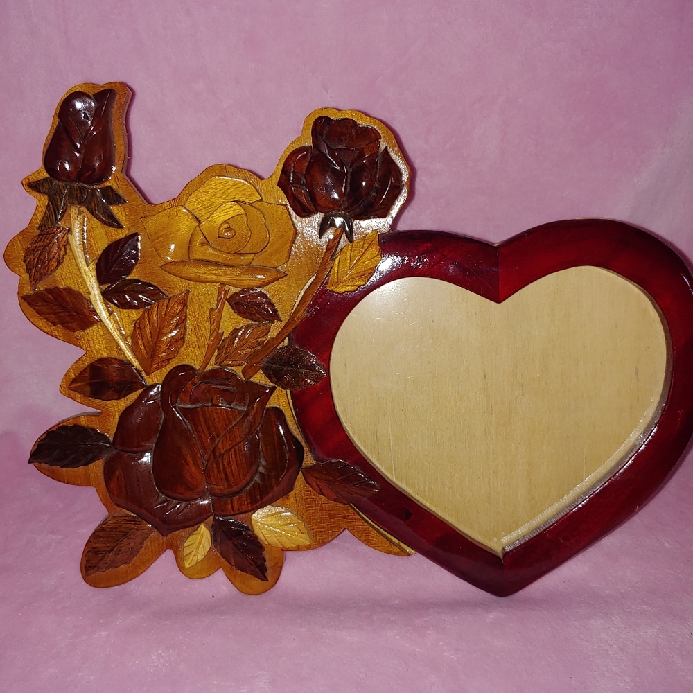 Vintage hand carved wooden picture frame.